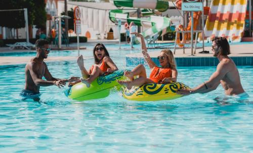 a group of people in a swimming pool at Sunrise Garden Beach Resort in Hurghada