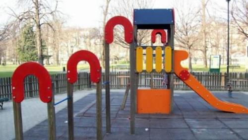 a playground with a slide at Chalet del paese Incantato comune di Moncenisio in Moncenisio