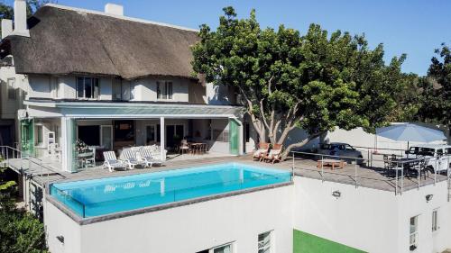 an aerial view of a house with a swimming pool at 4 Piet Retief in Stellenbosch