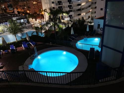Bazén v ubytování Benalmádena Apartamento Holidays los Patos nebo v jeho okolí
