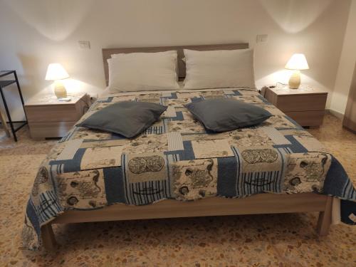 Postel nebo postele na pokoji v ubytování B&B 24 Maggio