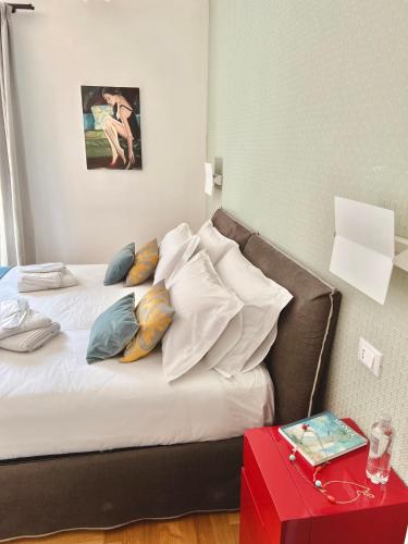 Postel nebo postele na pokoji v ubytování Archè Design Rooms and Suites