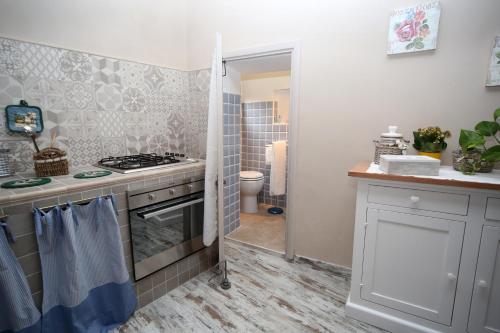 Koupelna v ubytování sacrobosco apartment Ulivo