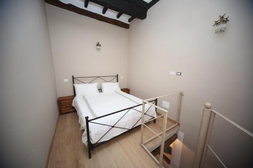 Ένα ή περισσότερα κρεβάτια σε δωμάτιο στο sacrobosco apartment Abete