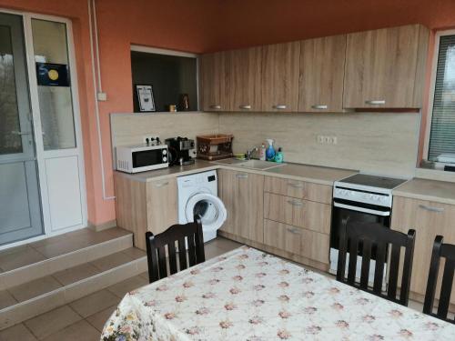 A kitchen or kitchenette at Nadya Holiday Home