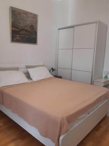 Postel nebo postele na pokoji v ubytování Mulo Staničića