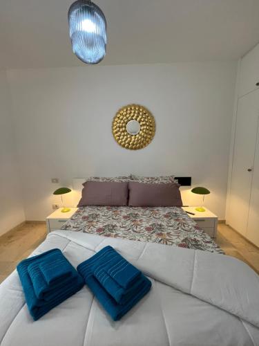 A bed or beds in a room at DREAM CURTIDOS