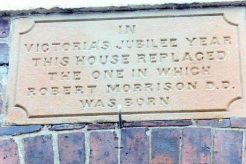 a sign on the side of a building at The Nook, Morpeth Town in Morpeth
