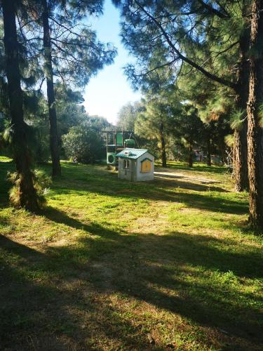 a campsite in the middle of a field with trees at Cara Catherine in Geremèas
