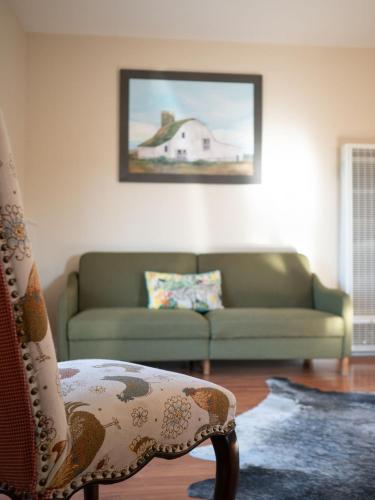 a living room with a couch and a chair at Z Ranch in Templeton