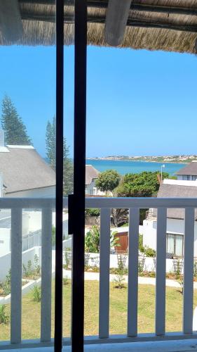 a view of the ocean from a balcony at Beachside in the heart of St Francis Bay Village in St Francis Bay