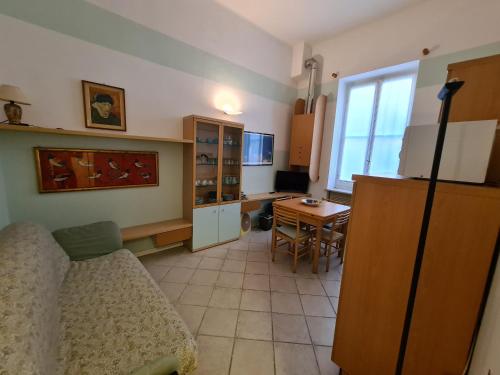 TV a/nebo společenská místnost v ubytování La Casa di Rosa by PortofinoVacanze