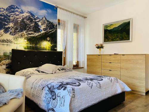 Posteľ alebo postele v izbe v ubytovaní Apartament Rodzinny Gubałówka