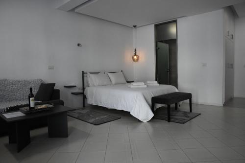 Кровать или кровати в номере City Heart Luxury Studio Aurora