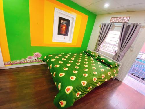 Cama o camas de una habitación en Suri's House Homestay