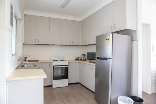 Kuchyň nebo kuchyňský kout v ubytování Harriet House Tumut