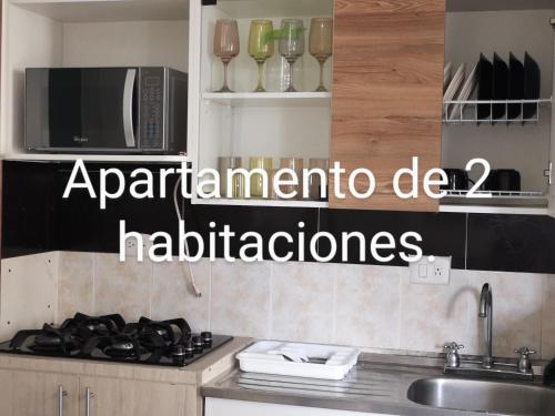 Kuchyň nebo kuchyňský kout v ubytování Cómodos y acogedores Apartaestudios - Manizales
