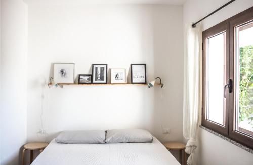 Ένα ή περισσότερα κρεβάτια σε δωμάτιο στο Residenze Branca I SeaView