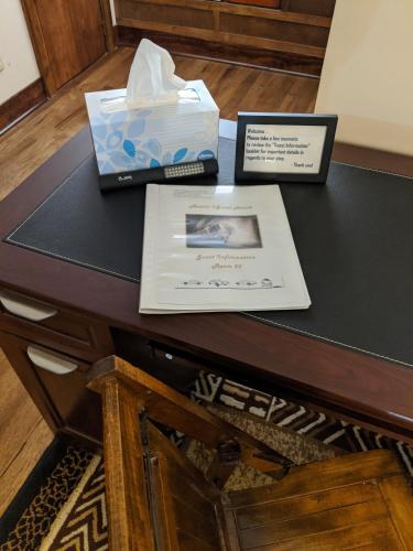 a table with a box on top of a table at The Avanti Houses in South Bend