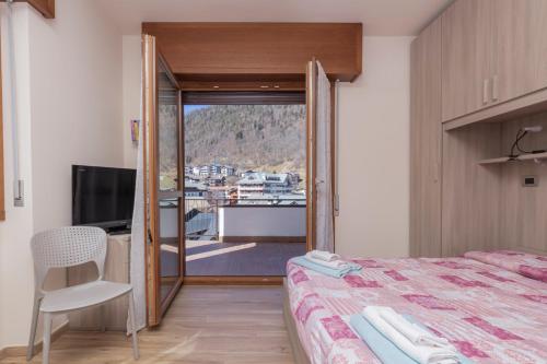 Ένα ή περισσότερα κρεβάτια σε δωμάτιο στο Europa Master Guest apartment