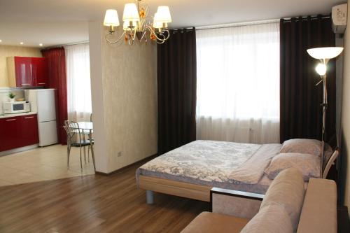 Кровать или кровати в номере Апартаменты Бизнес на Московском Проспекте