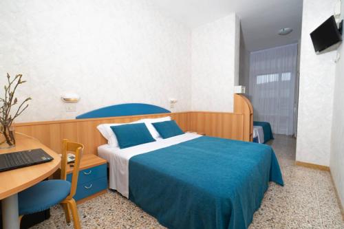 Postel nebo postele na pokoji v ubytování Hotel Sampaoli