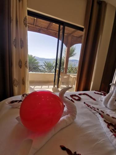 Postel nebo postele na pokoji v ubytování Nice View Hotel فندق الأطلالة الجميلة للعائلات فقط