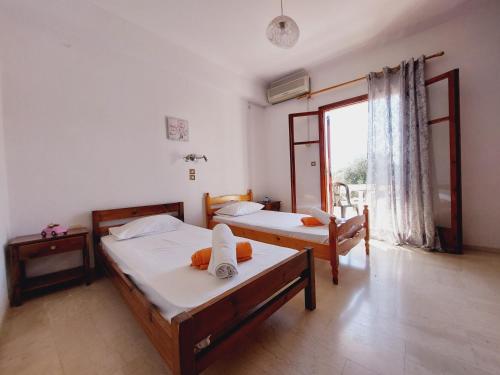Krevet ili kreveti u jedinici u okviru objekta Corfu Elpis Apartments