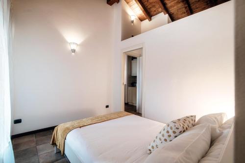 Ein Bett oder Betten in einem Zimmer der Unterkunft Lake Nest - by MyHomeInComo