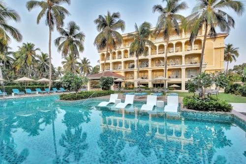 Bazén v ubytování Holiday Inn Goa Candolim nebo v jeho okolí
