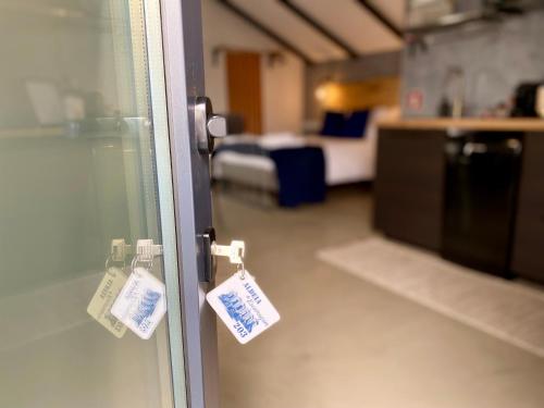 a room with a door with tags on it at Villa Rio by Valada Village in Valada