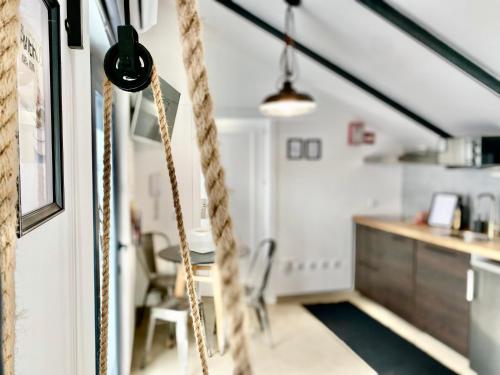a rope hanging from a wall in a room at Villa Rio by Valada Village in Valada
