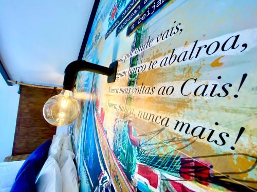 a close up of a lamp with a bunch of books at Villa Rio by Valada Village in Valada