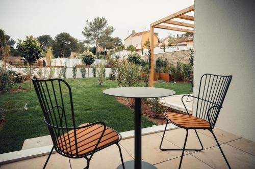 Сад в Van der Valk Hotel Bloom Saint Aygulf