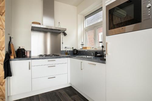 Cucina o angolo cottura di Vakantiewoning Suderhaven