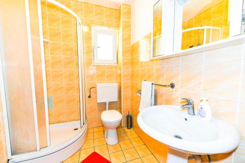 Koupelna v ubytování Apartments Silvia