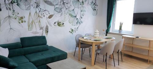 TV a/nebo společenská místnost v ubytování Apartament Botanika