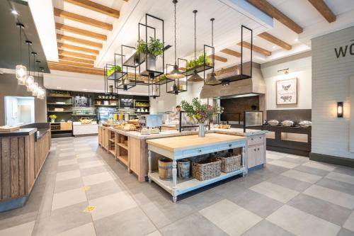 a large kitchen with a large island in a restaurant at Midgard in Khorusepa