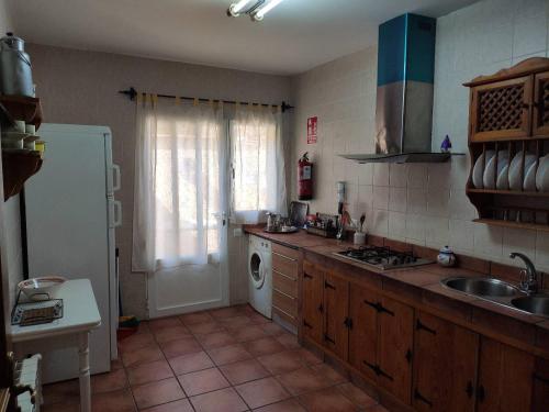 Kuchyň nebo kuchyňský kout v ubytování Casa Rural IRIS