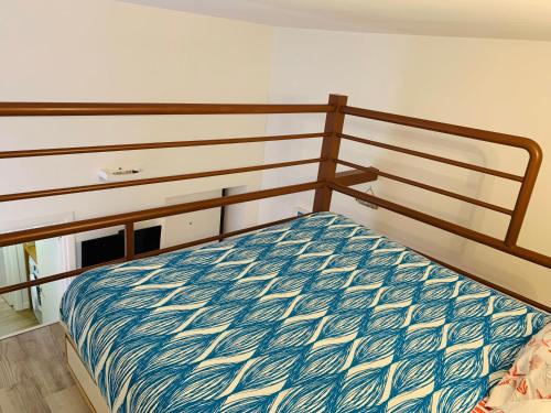 Una cama o camas en una habitación de Maelle Trastevere