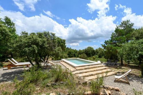 Piscina en o cerca de Mas de l'Arlequi