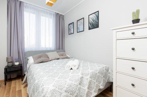 Кровать или кровати в номере Family Apartment Saska Kępa by Renters