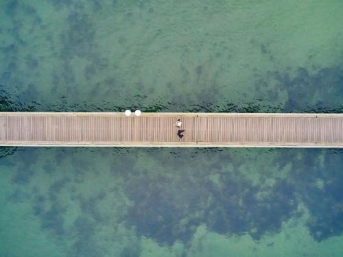 an overhead view of a bridge over the water at A-ROSA Ostseehotel Kühlungsborn in Kühlungsborn