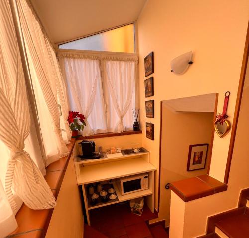 Ένα ή περισσότερα κρεβάτια σε δωμάτιο στο La Magnolia B&B