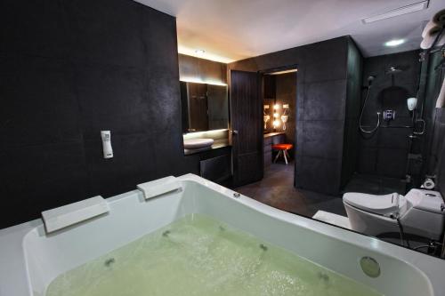 Koupelna v ubytování Swiss-Belinn Medan