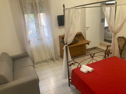 Ένα ή περισσότερα κρεβάτια σε δωμάτιο στο Casa Vacanze Mare