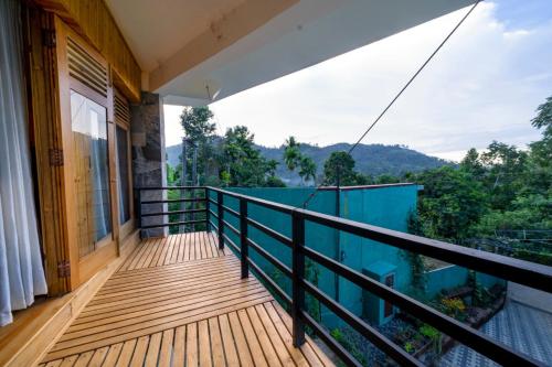a balcony of a house with a view at 3 Arch Resort Ella in Ella