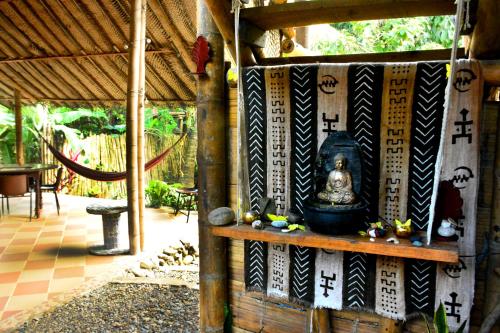Un jardín fuera de La Percha Hostal