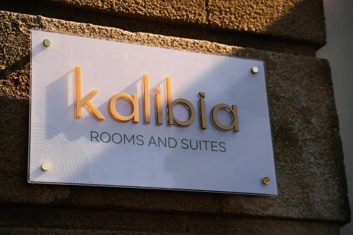 a sign for kilda rooms and suites on a building at Kalibia rooms and suites in Mazara del Vallo