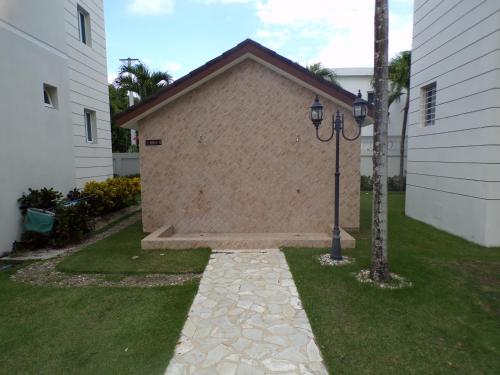 a building that is next to a house at Luxury in the Caribbean in Sosúa